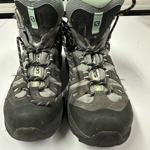 Salomon Gray and Black Athletic Shoes with Rugged Design